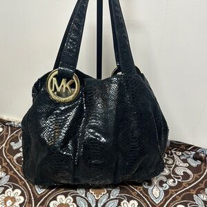 Michael Kors Black Hobo Bag with Gold Emblem